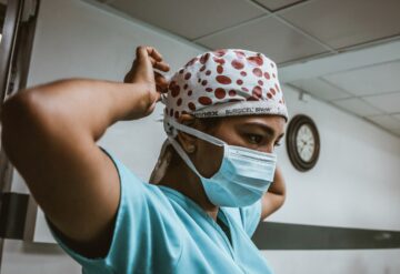 Nursing provider in mask and gown